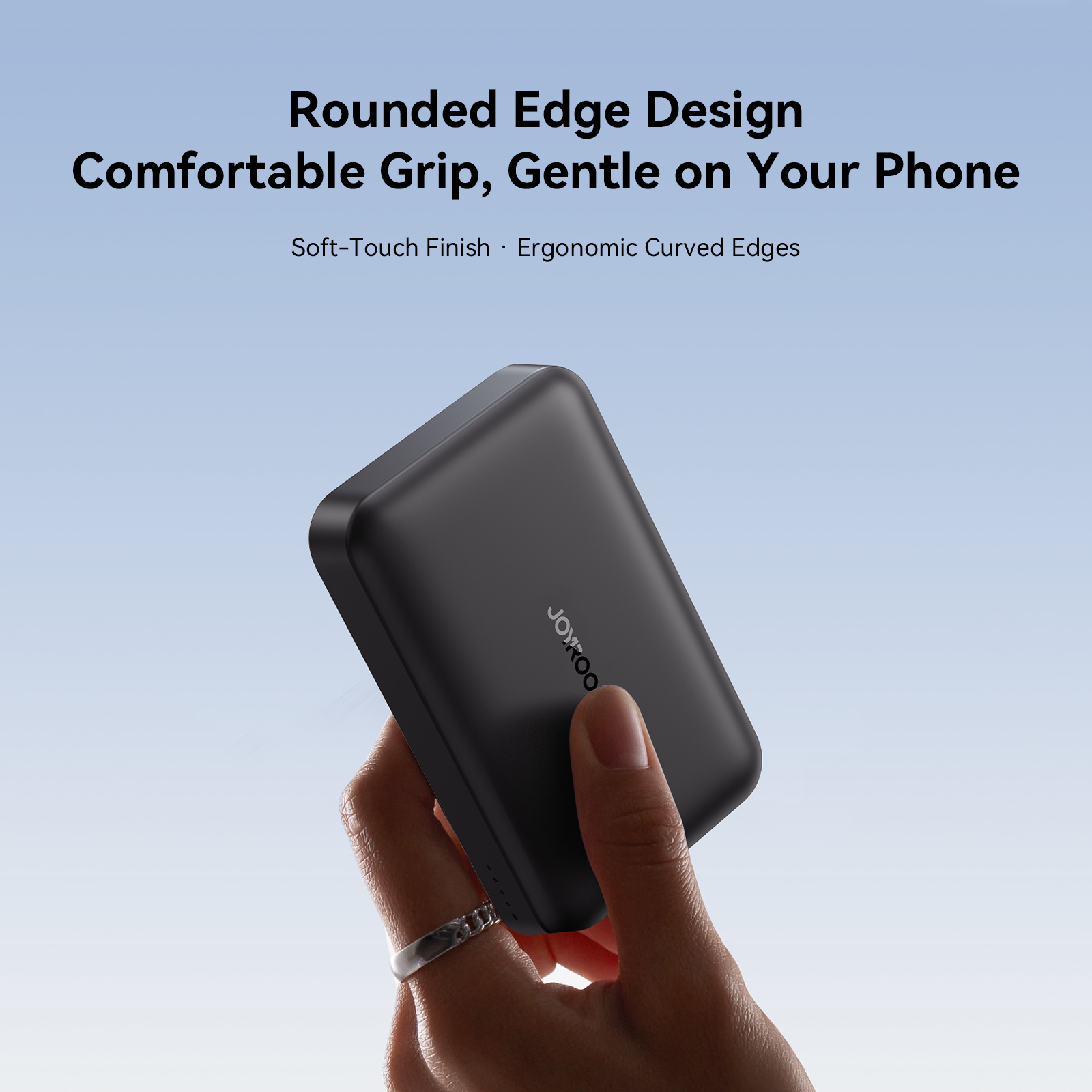 JOYROOM JR-W020 Pro magnetic power bank with soft touch excimer coating and rounded ergonomic edges held in hand