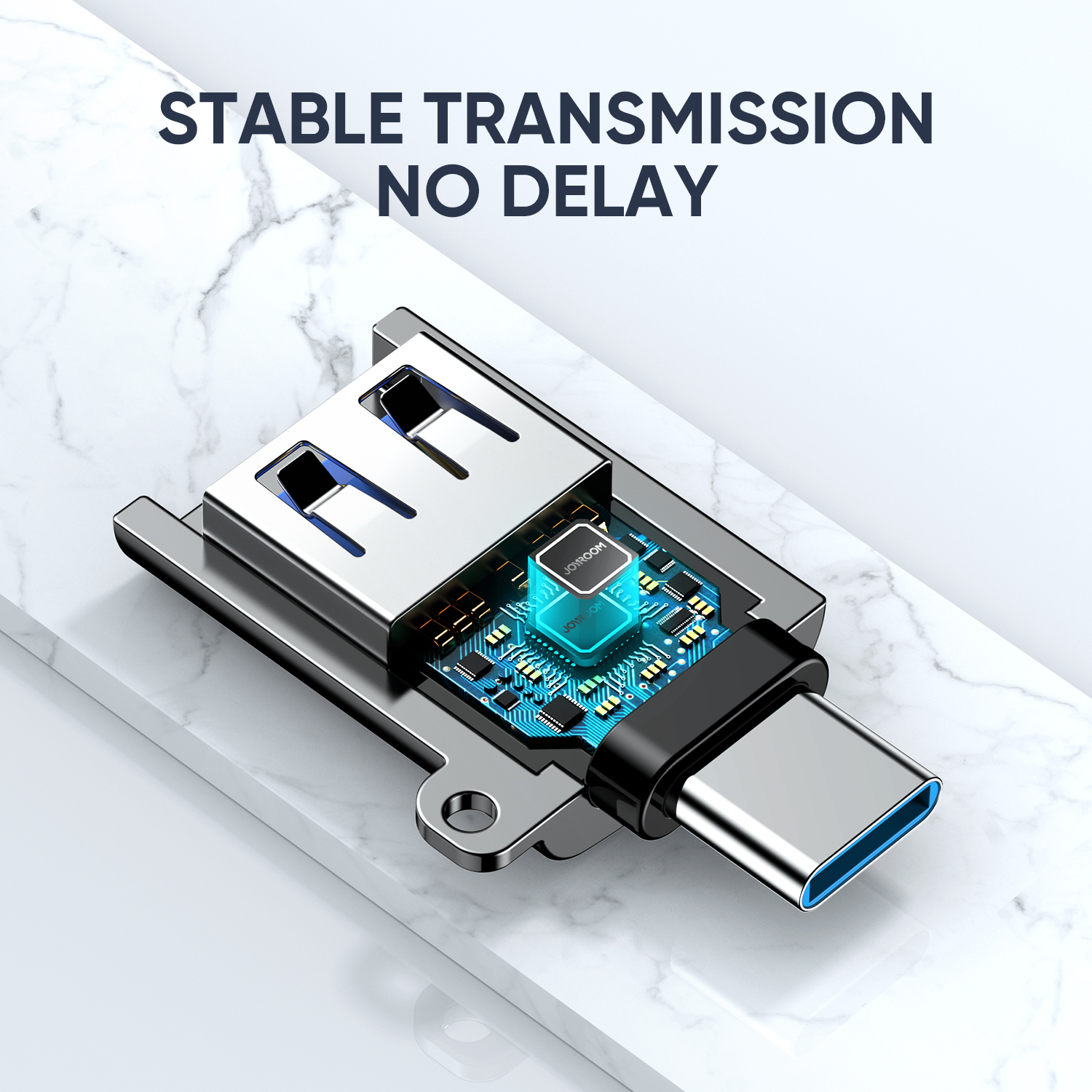 Close-up view of JOYROOM S-H151 Type-C to USB 3.0 female adapter with a cutaway showing the internal circuit board and smart chip. The text reads 'Stable transmission, no delay'. It features a zinc alloy shell and a small keyring hole